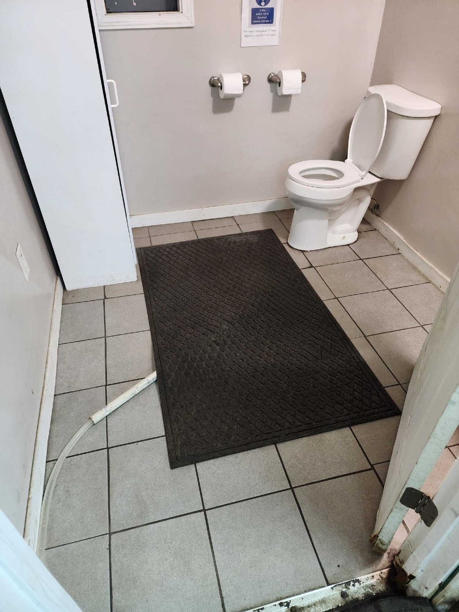 The same restroom floor clean after service
