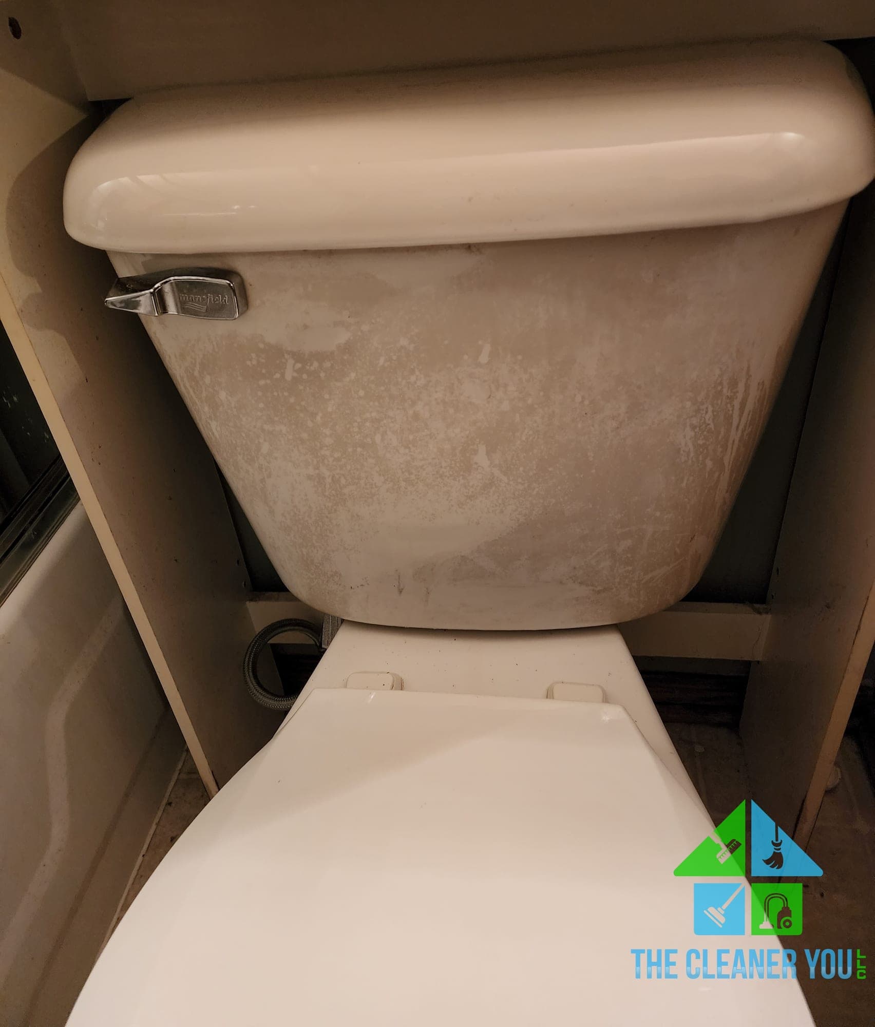 Toilet with mineral buildup before cleaning